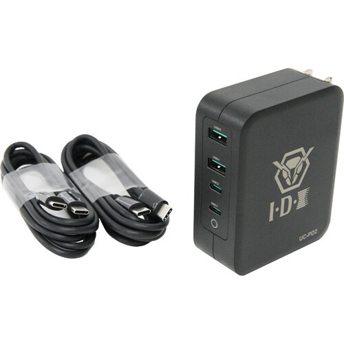 IDX UC‑PD2 compact USB‑C Power Delivery GaN charger with dual USB‑C ports, shown alongside two USB‑C charging cables.